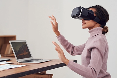 woman using vr goggles