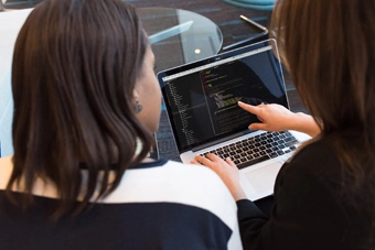 two girls coding